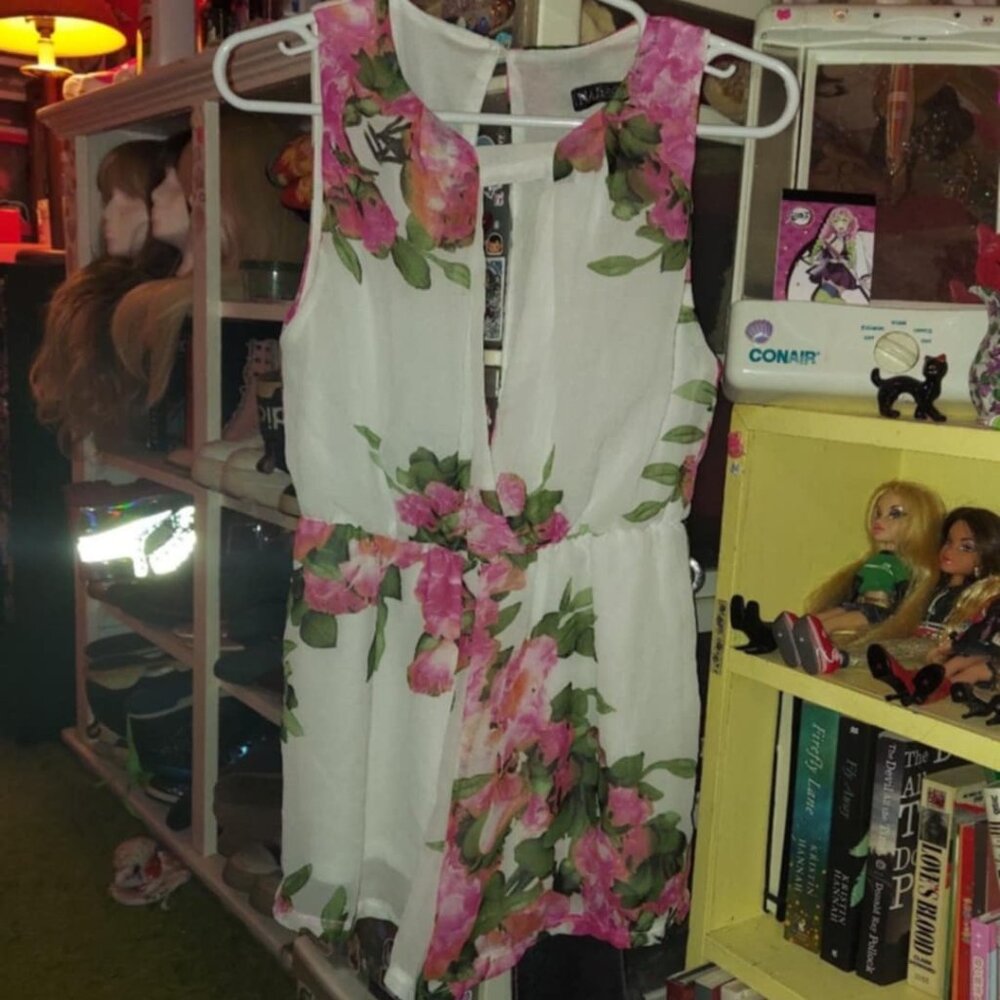 Delicate white floral plunge front romper